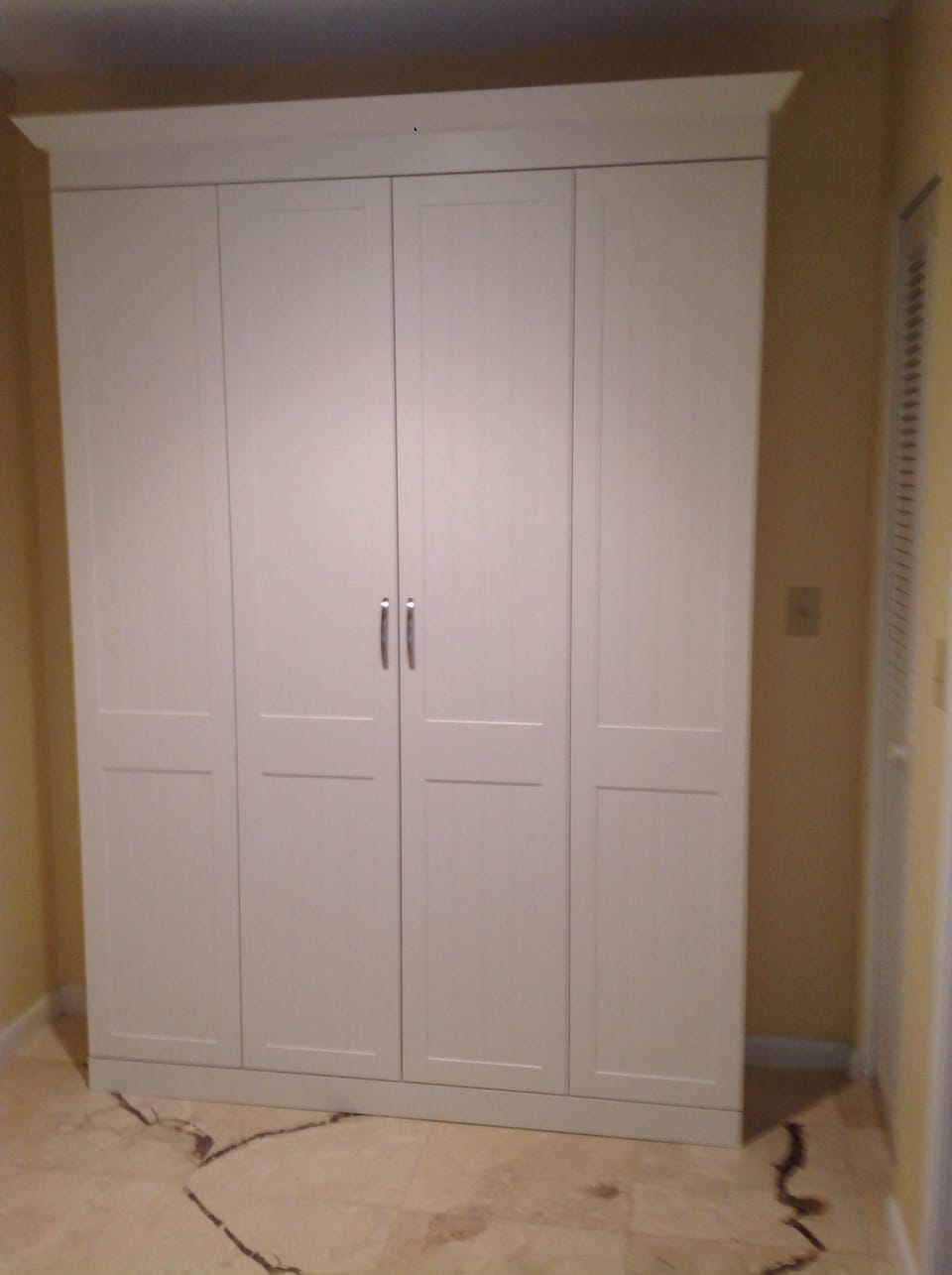 Murphy bed in nook off kitchen