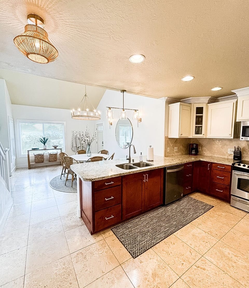 Updated kitchen with granite counters and high end amenities