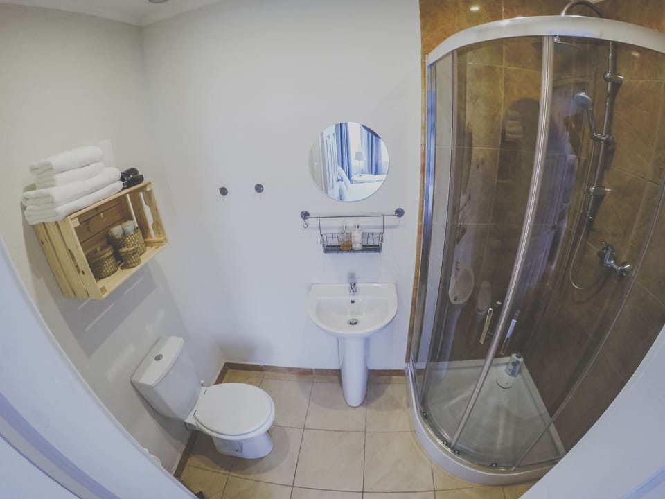 Standard Double Room, 1 Double Bed | Bathroom | Shower, rainfall showerhead, free toiletries, hair dryer