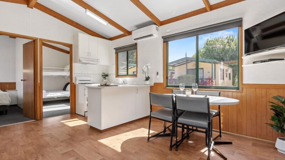Standard Two Bedroom Family Cabin, sleeps 5 | Private kitchen | Full-size fridge, microwave, oven, stovetop