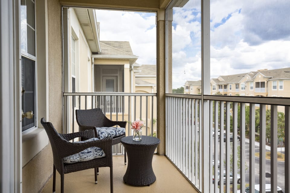 Sit back and relax in your private screened in patio 