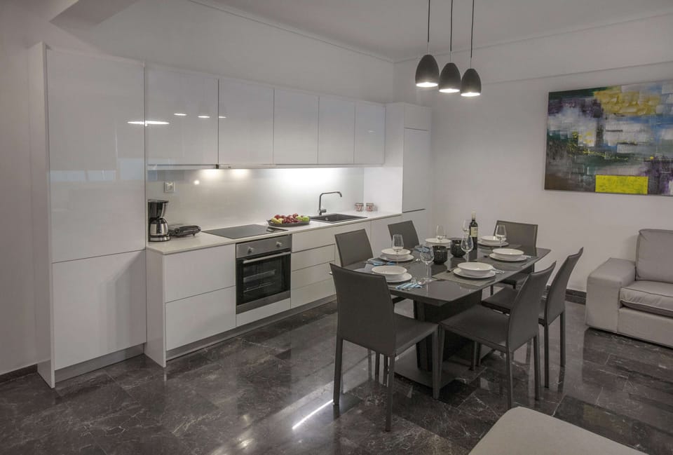 Family Apartment, 4 Bedrooms, Balcony | Private kitchen | Fridge, oven, stovetop, coffee/tea maker