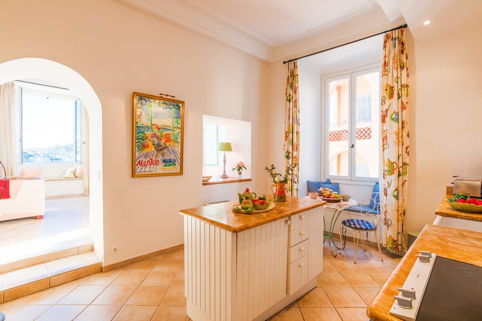 The kitchen overlooking the living-dining room