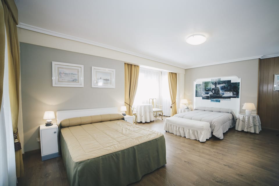 Family Room | Down comforters, free WiFi, bed sheets