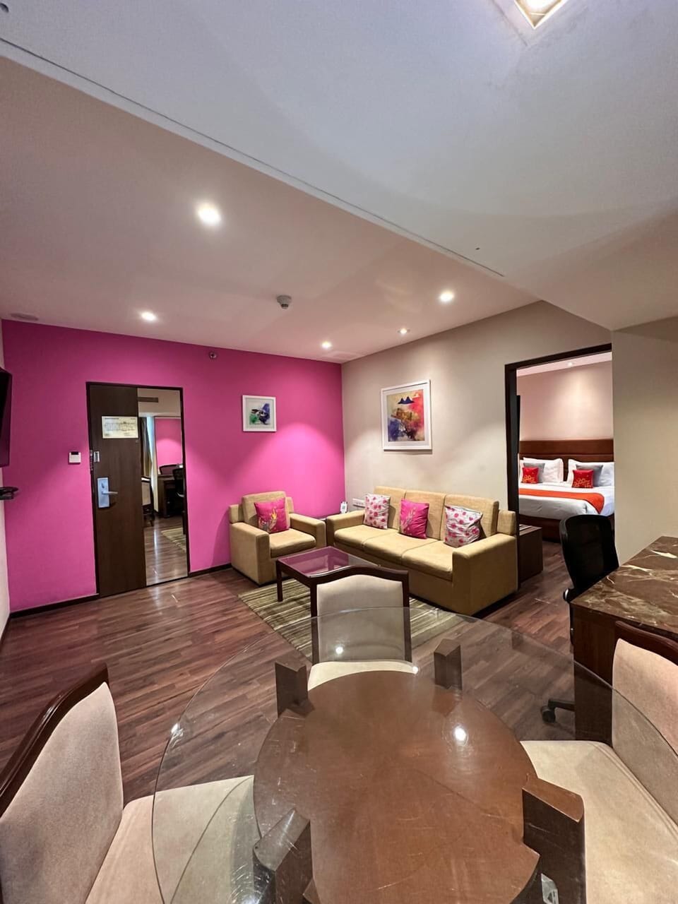 Premier Suite, 1 King Bed | Living room | 32-inch LCD TV with satellite channels, TV, DVD player