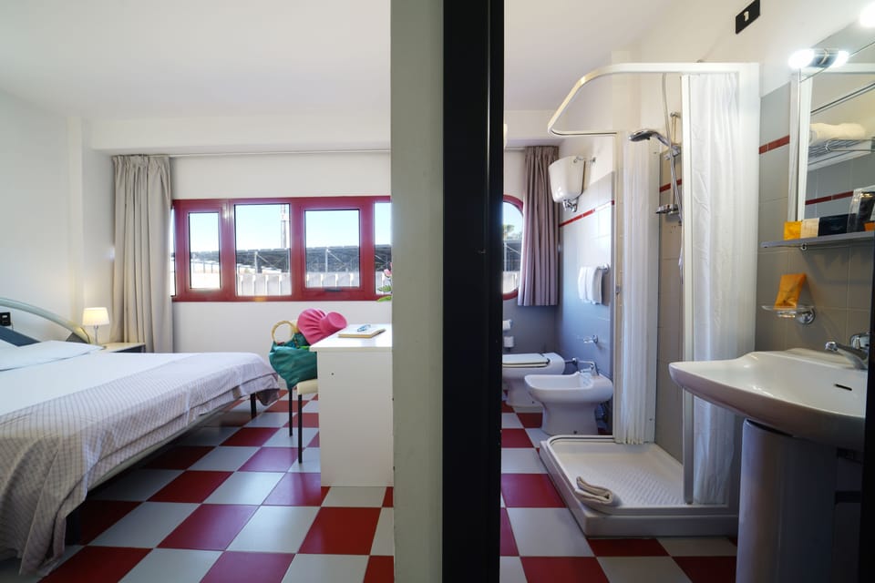 Double or Twin Room | Desk, blackout drapes, bed sheets