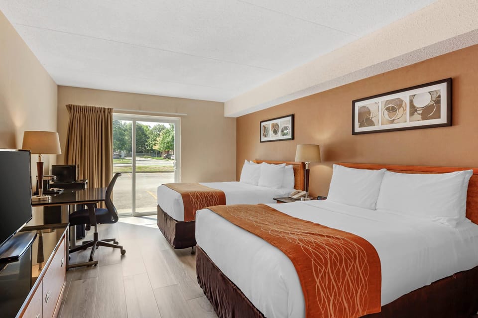 Standard Room, 2 Double Beds, Non Smoking, Ground Floor | Desk, laptop workspace, blackout drapes, iron/ironing board