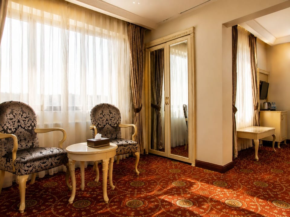 Royal Suite, 1 King Bed | Living area | Flat-screen TV