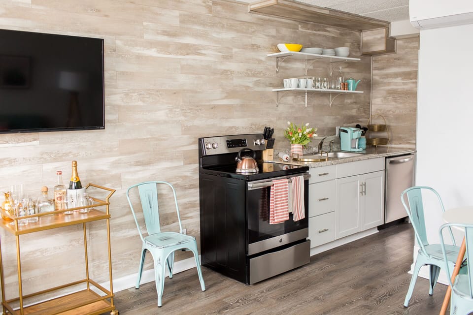 One Bedroom Apartment Suite - Courtyard View | Private kitchen | Full-size fridge, microwave, coffee/tea maker, toaster
