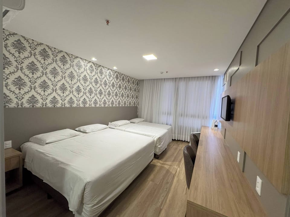 Superior Quadruple Room | Minibar, desk, free WiFi, bed sheets