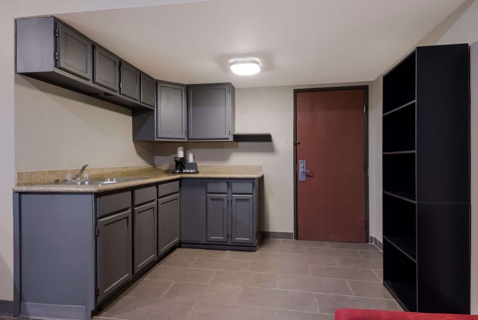 Suite, 1 King Bed, Non Smoking (with Sofabed) | Blackout drapes, iron/ironing board, free WiFi, bed sheets