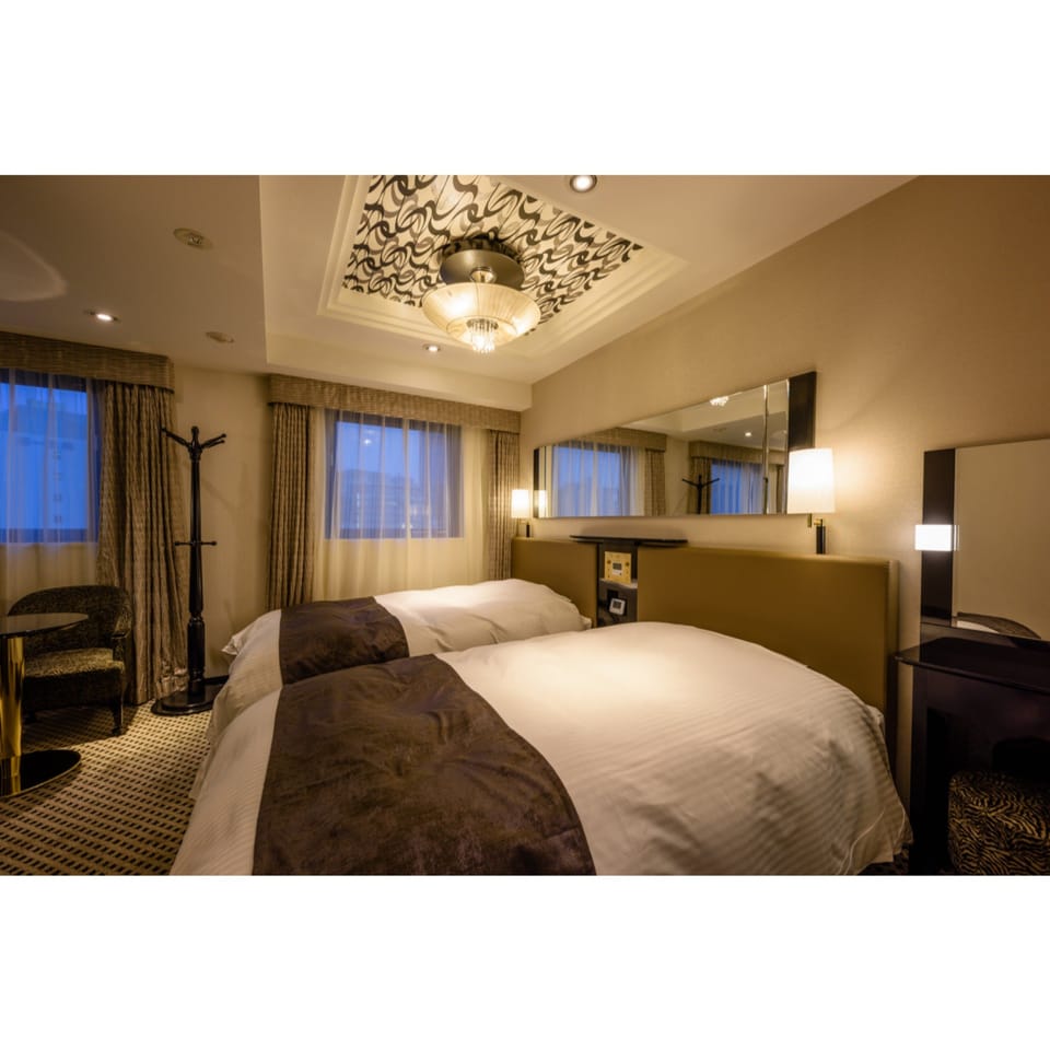 Deluxe Twin Room, Non Smoking | Desk, blackout drapes, soundproofing, iron/ironing board