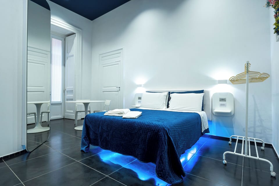 Comfort Room | 1 bedroom, in-room safe, desk, blackout drapes