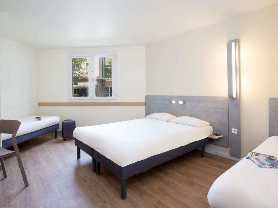 Family Room, 2 Double Beds | Desk, WiFi (free), bed sheets