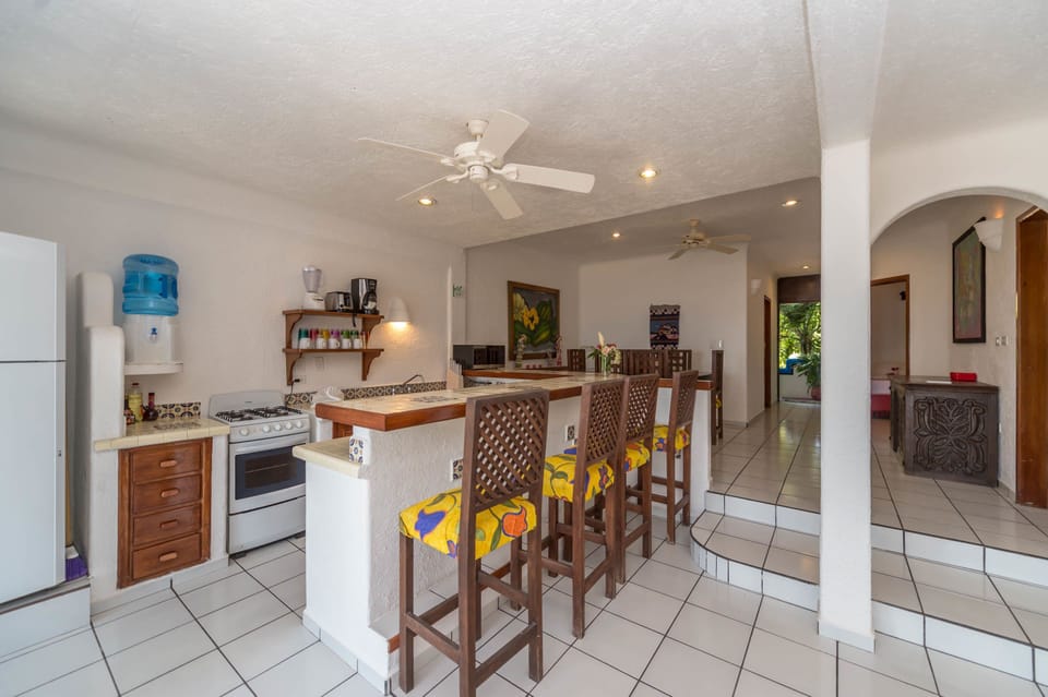 Standard Condo, 2 Bedrooms, Beachfront | Private kitchen | Mini-fridge, coffee/tea maker