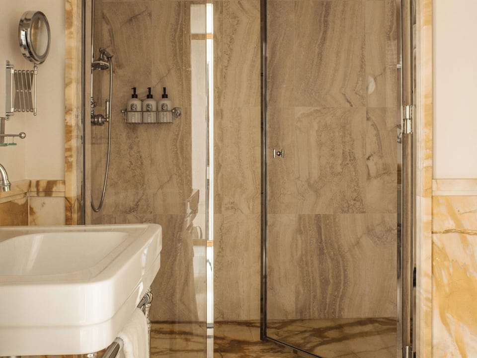 Deluxe Room | Bathroom | Designer toiletries, hair dryer, bathrobes, slippers