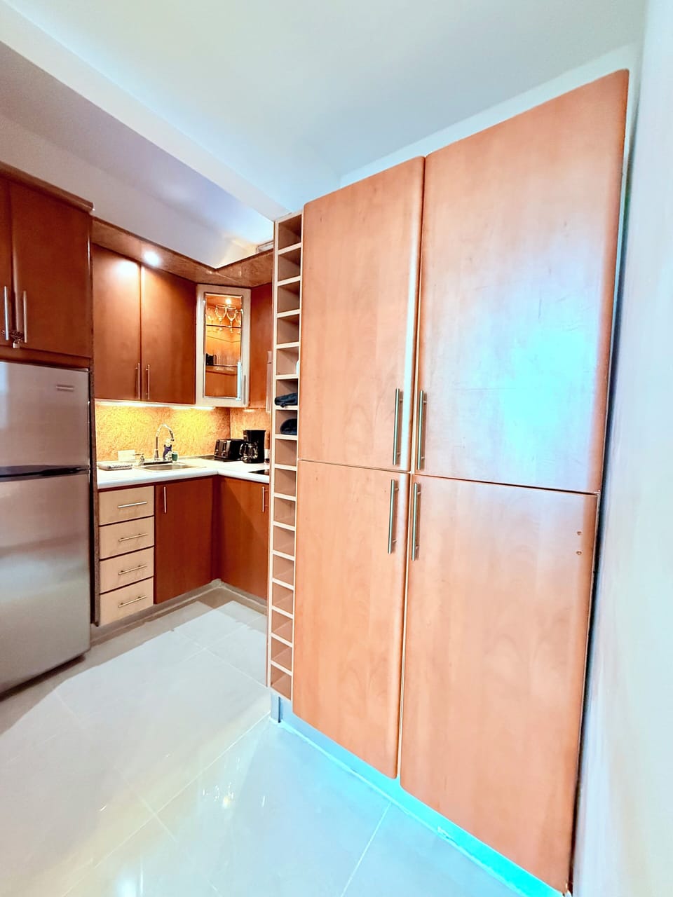 Fridge, microwave, stove, utensils, cooking pots, coffee maker, toaster, dishes