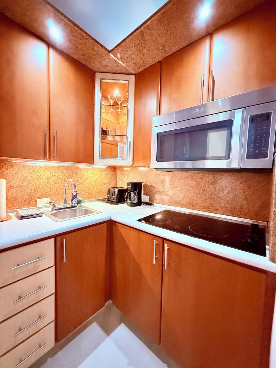 Fridge, microwave, stove, utensils, cooking pots, coffee maker, toaster, dishes