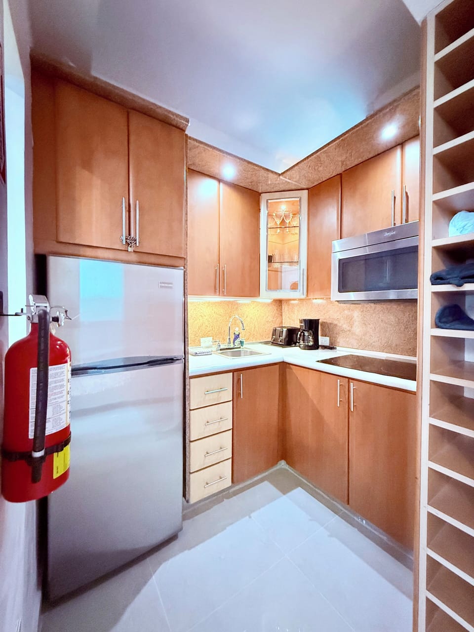 Fridge, microwave, stove, utensils, cooking pots, coffee maker, toaster, dishes