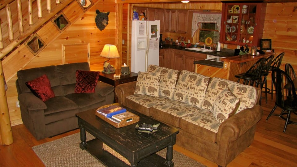 Queen Sleeper Sofa & comfy reclining Loveseat invite you to stretch out & relax