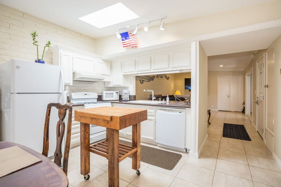 Fully equipped kitchen with everything needed for cooking and extended stays.