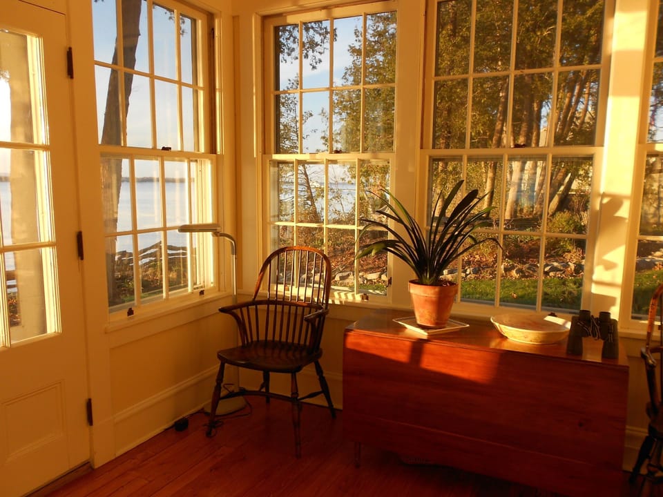 The front porch offers the perfect location for looking out on Lake Champlain.