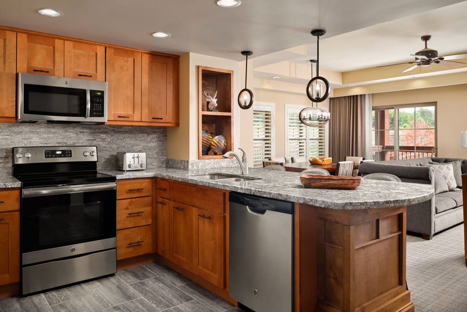 Full-size fridge, microwave, stovetop, dishwasher