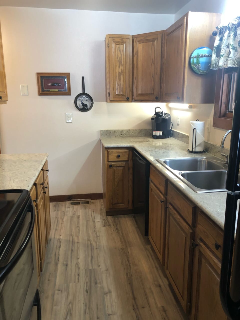 Fully equipped kitchen, granite counters, new flooring added Spring 2021.
