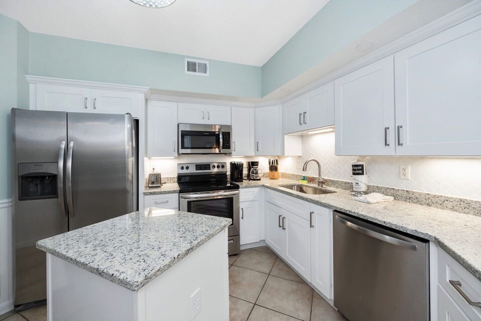 Newly renovated, fully stocked kitchen. Coffee pot, Keurig, crock pots & more.