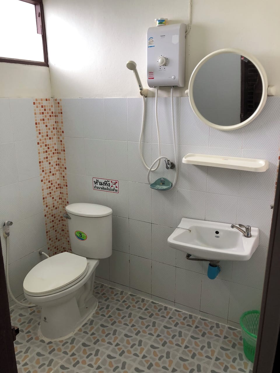 Shower, free toiletries, slippers, towels