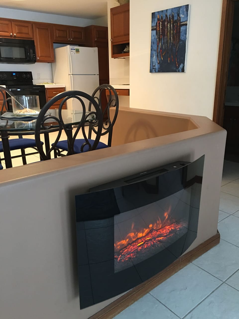 No need to put another log on, this fireplace is always stoked and ready.