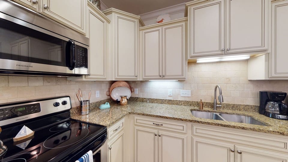 Lots of counter space and stainless steel appliances.
