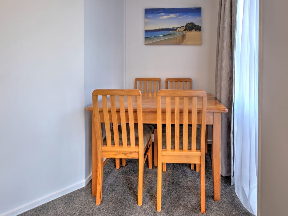 Two Bedroom | Living area | 32-inch TV with satellite channels, DVD player