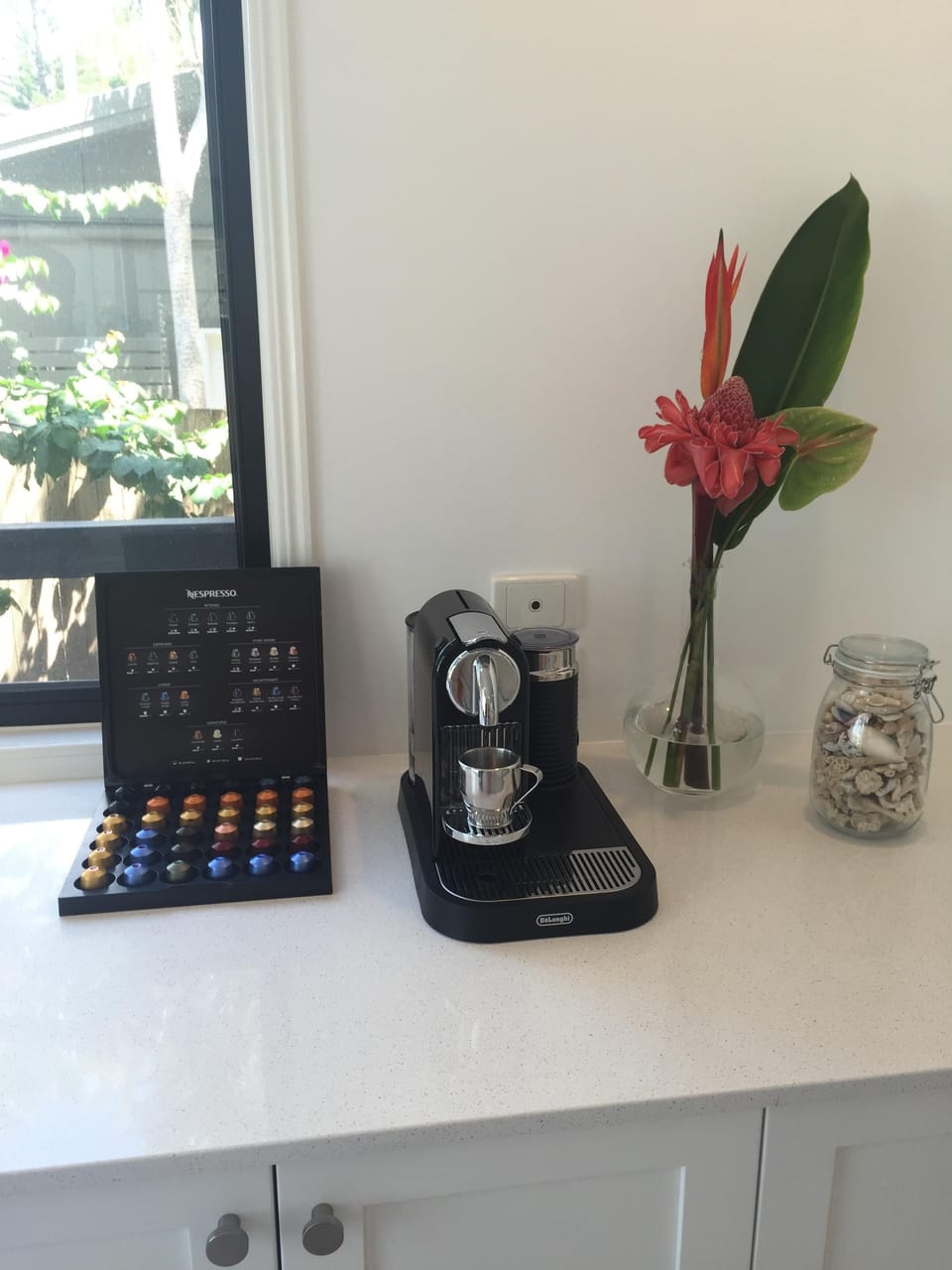 Nespresso machine & a supply of coffee pods