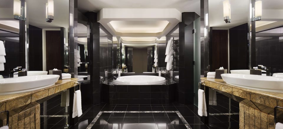 Separate tub and shower, deep soaking tub, hair dryer, bathrobes
