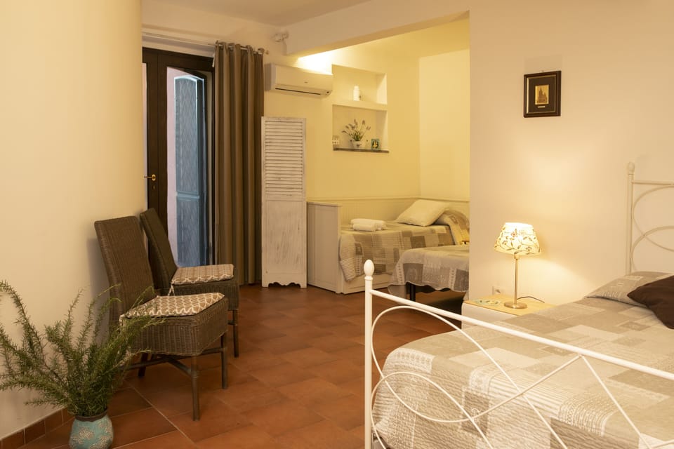 Family Room, Terrace, Garden View | Free WiFi, bed sheets