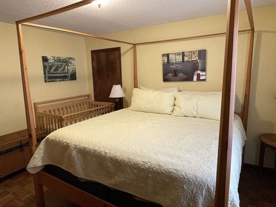 Master bedroom (+ crib) upstairs, with full bath with shower.