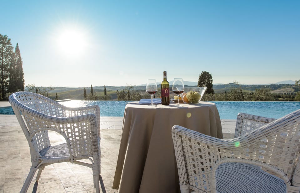 Seasonal outdoor pool, an infinity pool, sun loungers
