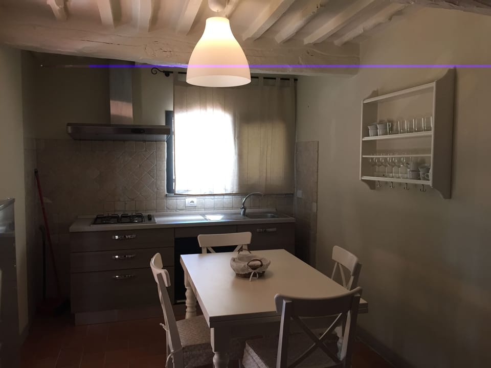 Duplex, 2 Bathrooms (Appartamento 7) | Private kitchenette | Fridge, oven, stovetop, coffee/tea maker