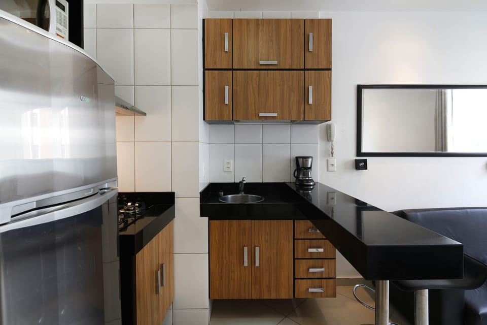 Apartment | Private kitchenette | Full-size fridge, microwave, stovetop, cookware/dishes/utensils