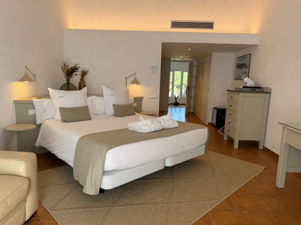 Junior Suite, 1 King Bed, Balcony | In-room safe, desk, free WiFi, bed sheets