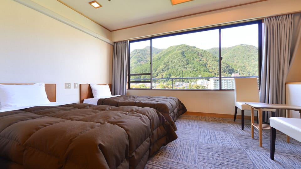 [Main Building] Twin Room with Tatami Area with River view, Smoking | In-room safe, blackout drapes, bed sheets