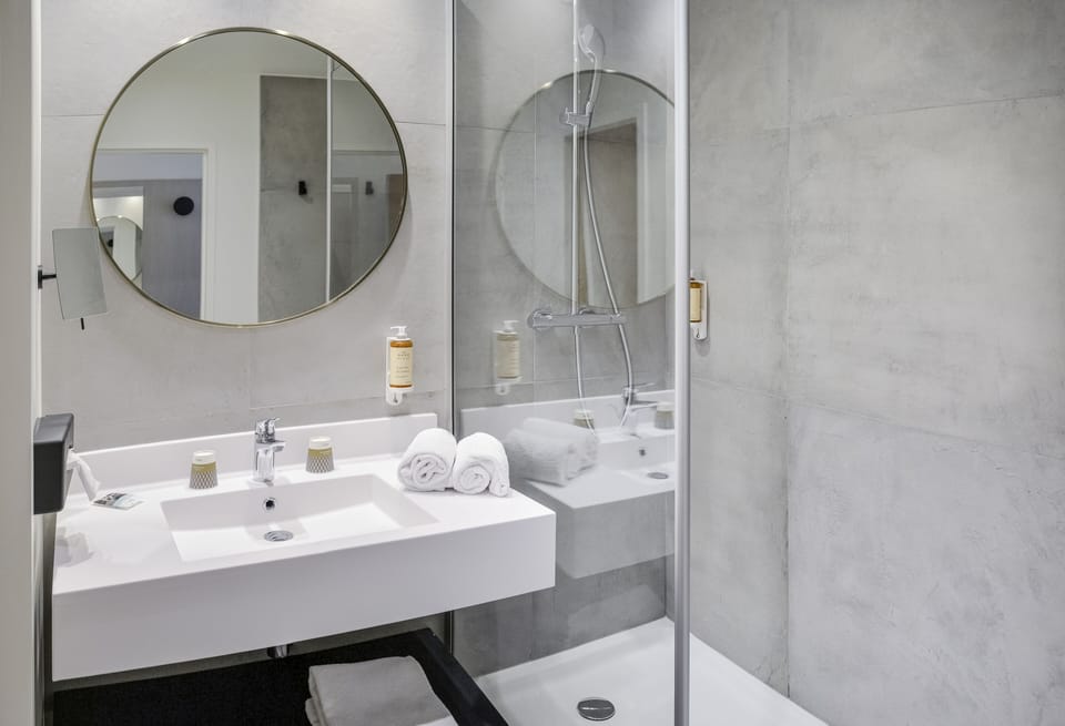 Eco-friendly toiletries, hair dryer, towels, soap