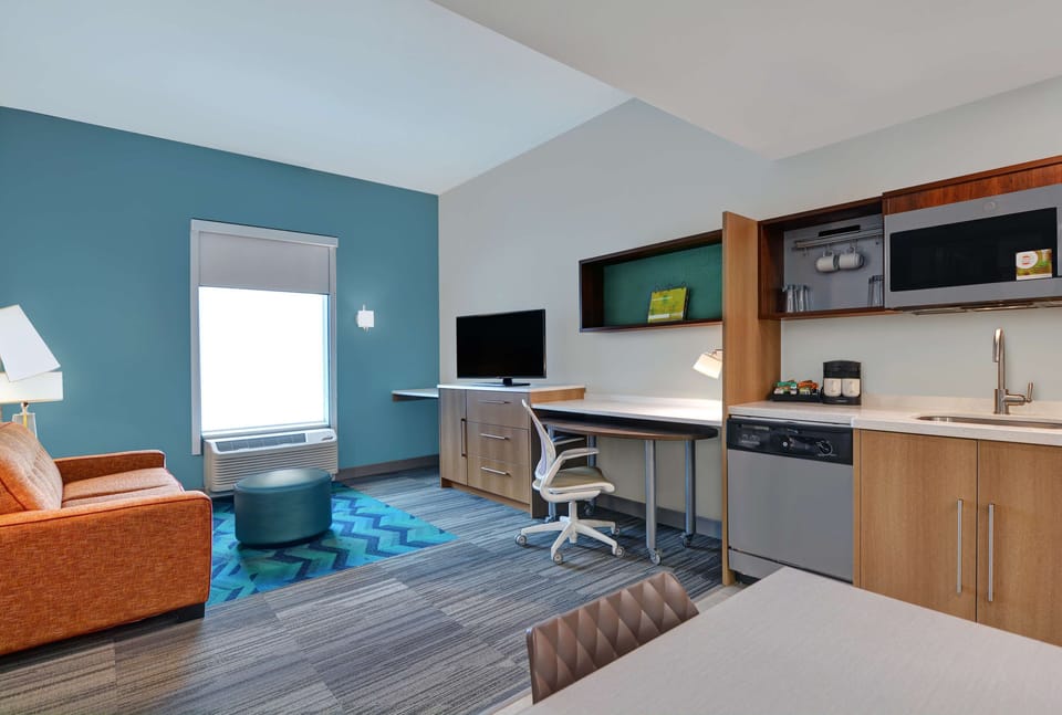 Down comforters, in-room safe, cribs (free), WiFi (free)