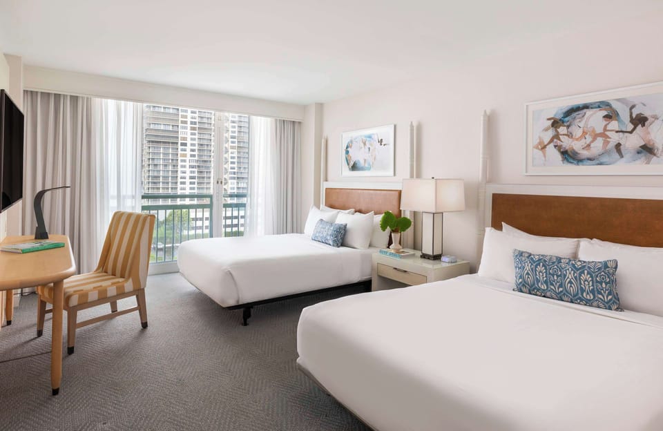Premium bedding, down comforters, pillowtop beds, in-room safe
