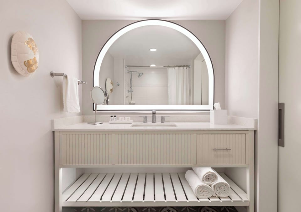 Designer toiletries, hair dryer, towels, soap