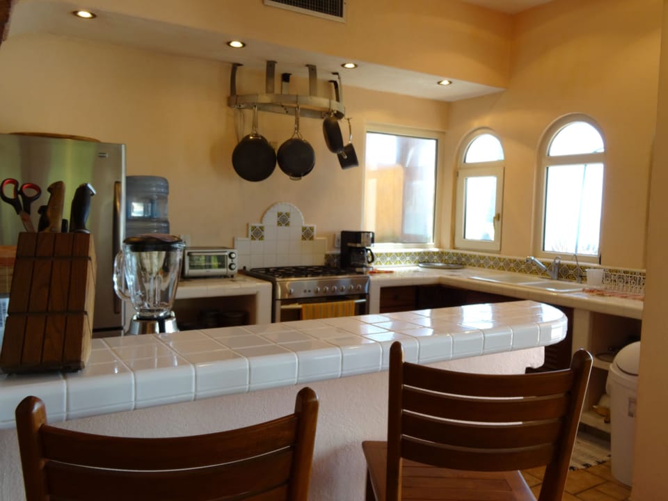 Exclusive Townhome, 2 Bedrooms | Private kitchen | Fridge, microwave, oven, stovetop