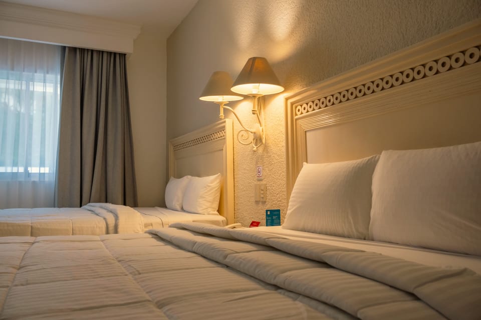 Standard Room, 2 Double Beds | Desk, blackout drapes, iron/ironing board (on request), cribs (free)