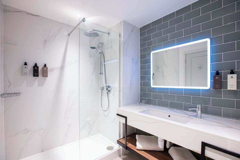 Deluxe Double or Twin Room - Exclusively For Adults | Bathroom | Hair dryer, bathrobes, towels, soap