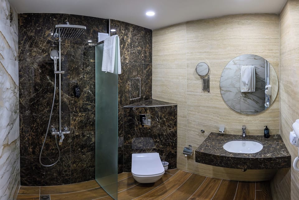 Double Room | Bathroom | Shower, hair dryer, towels, soap
